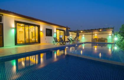 Kalkan Üzümlü Mevkiinde 3 Yatak Odalı 6 Kişilik Korunaklı Tatil Villası