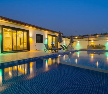 Kalkan Üzümlü Mevkiinde 3 Yatak Odalı 6 Kişilik Korunaklı Tatil Villası