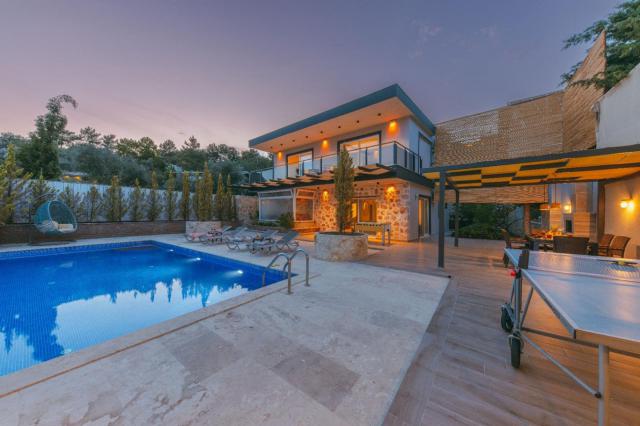 Kalkan İslamlar Mevkiinde Korunaklı 4 Kişilik Tatil Villası