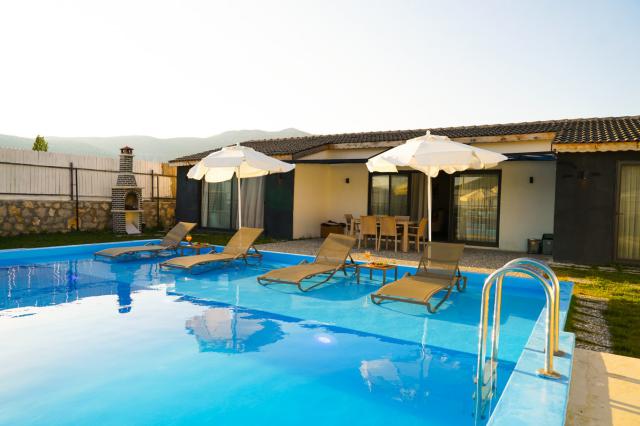 Kalkan Bezirgan Köyünde Bahçeli Kiralık Villa