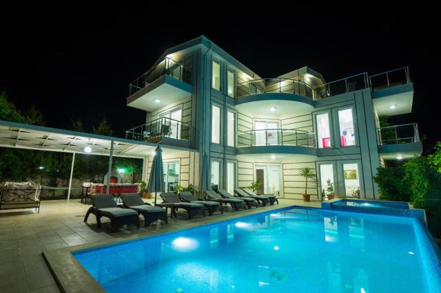 Kalkan İslamlar Mevkiinde Korunaklı 8 Kişilik Tatil Villası 