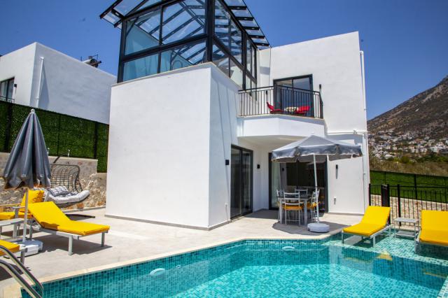 Kalkan Ortaalan Mevkiinde 2 Yatakodalı Kiralık Tatil Villası