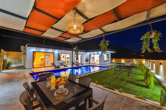 Kalkan Sarıbelen Mevkiinde 6 Kişiilik Tatil Villası